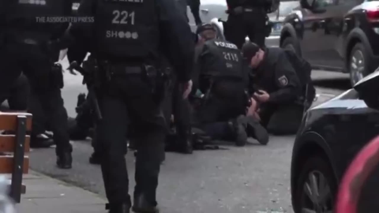 Police shoot man allegedly threatening them with axe in German city hosting