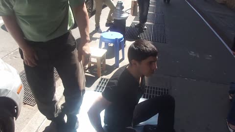 Luodong Massages Man In Black Clothes On Sidewalk