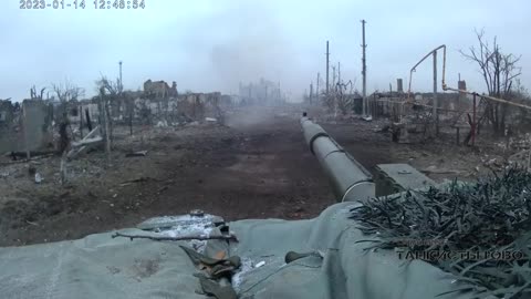 Russian T-90M MBT Driving through a destroyed town