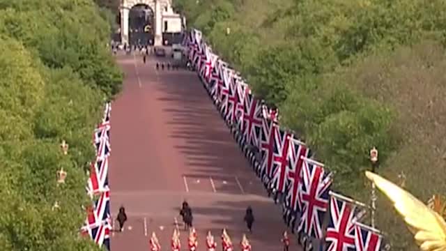 Princes walk behind Queen's coffin 25 years after Diana