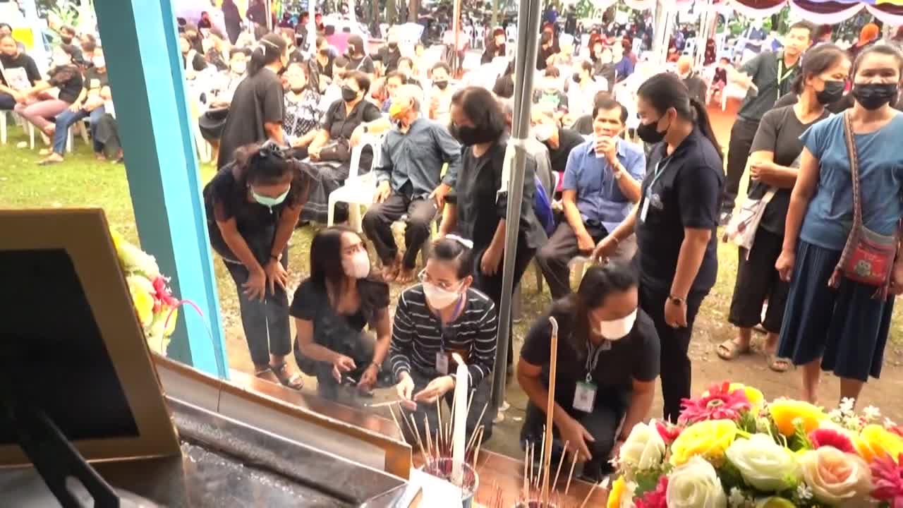 People pray for Thailand mass shooting victims at temple