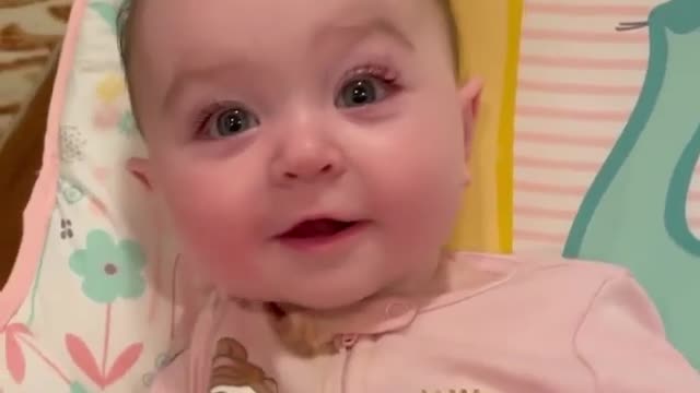 Cute baby reacting on her mother love