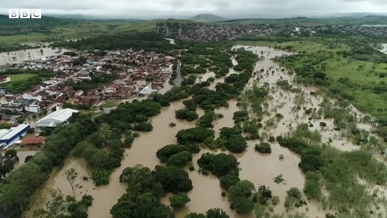 Dams burst in Brazil as deadly flooding continues - BBC News