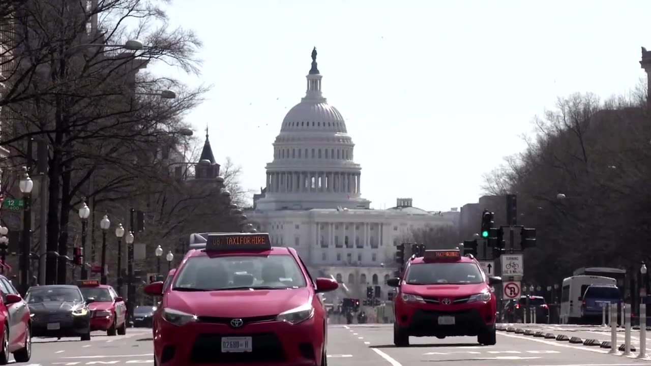 US eases tailpipe rules, slows EV transition | REUTERS