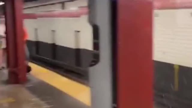 Water pours down 42ndStreet subway