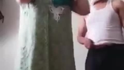 Arab husband and wife friendly fight