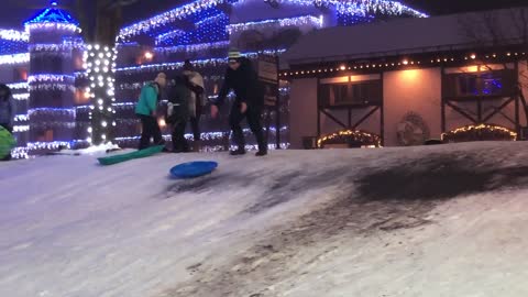 Man Faceplants As He Runs Down A Snowhill To Chase After His Sled