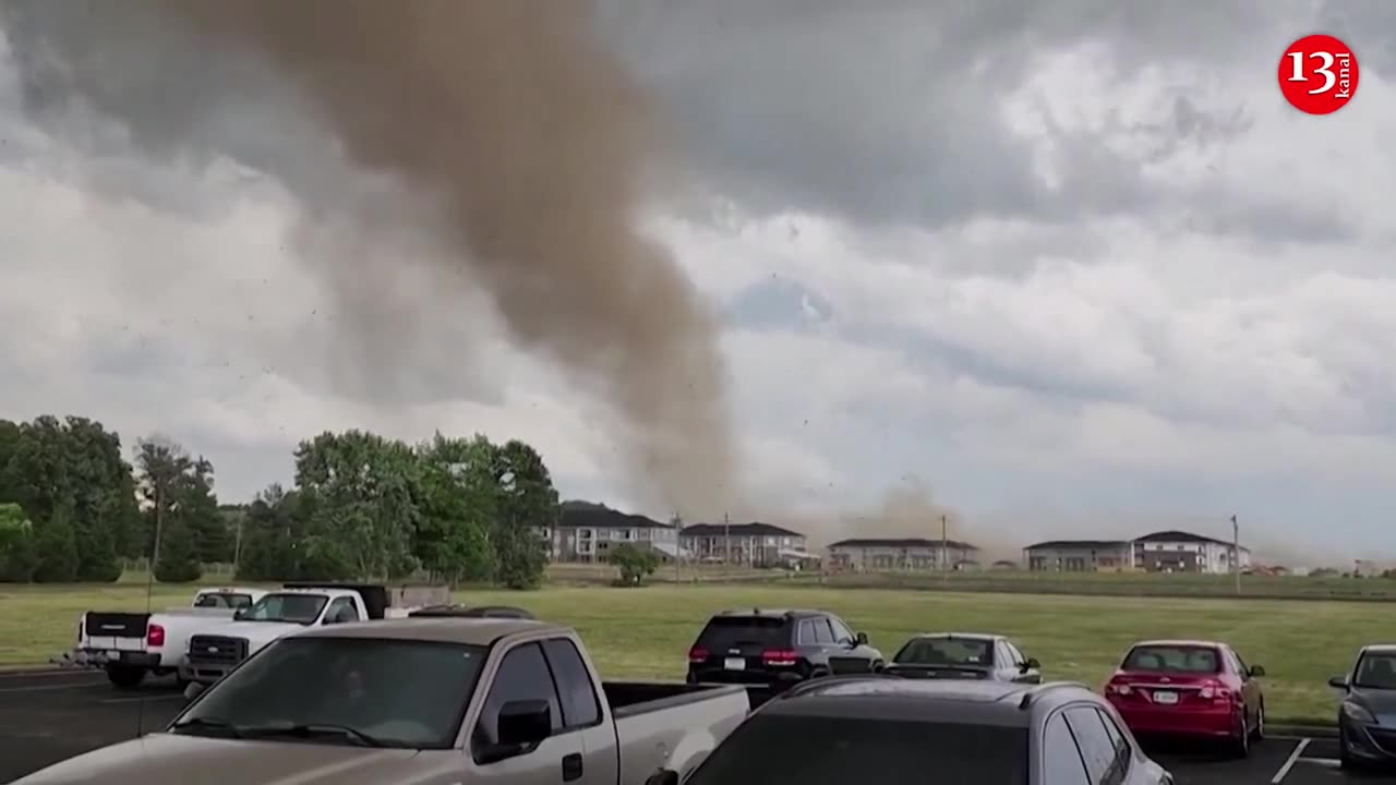 Debris spins through the air as tornado rips through Indiana buildings