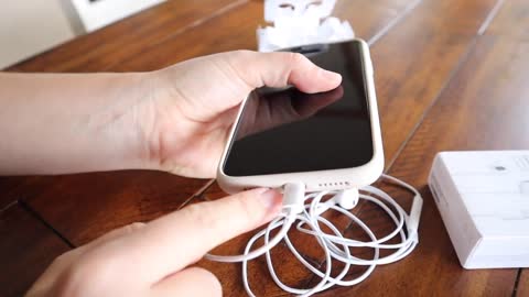 Apple EarPods Headphones with Lightning Connector.