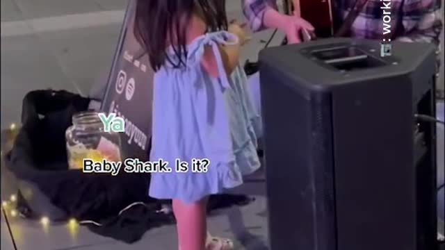 Orchard busker fulfills toddler's 'Baby Shark' song request