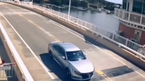 Car crash - weird moment caught on camera #trending #carcrash #bridge #caughtoncamera