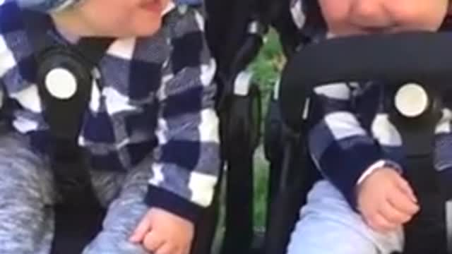 Twins kids laughing