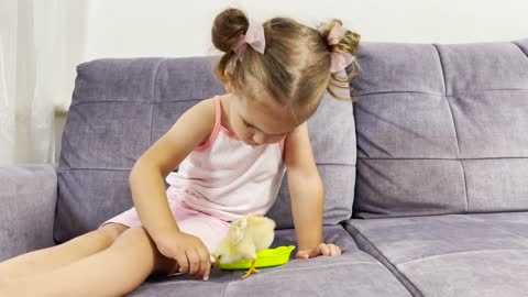 Adorable Baby Girl Loves Baby Chick!