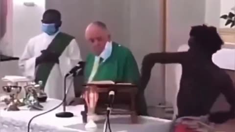 Illegal Alien Desecrating Bible & Mass Service