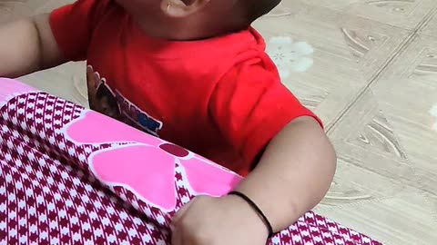 Indian 10 month old boy playing