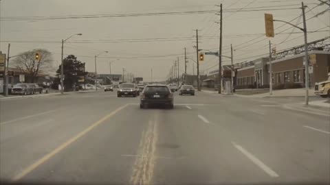 Motorcycle Ran a Red Light Then Got Clipped by a Car Attempting to Turn