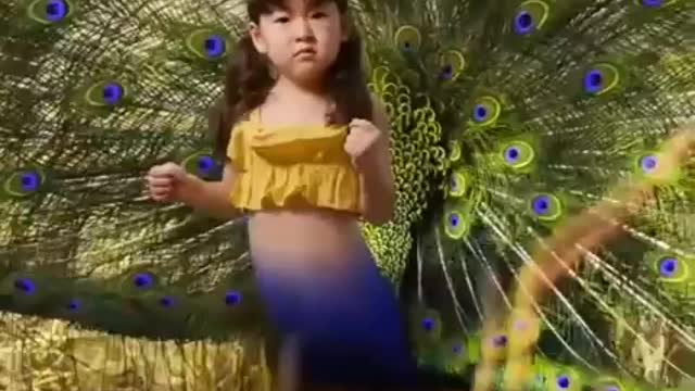 Kid thinks she's Peacock, refuses to move unless acknowledged!