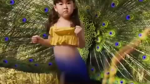 Kid thinks she's Peacock, refuses to move unless acknowledged!