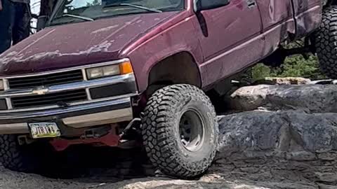 Silverado easing down rocky ledges Tuttle ORV