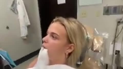 Girl sings National Anthem after having wisdom teeth surgery