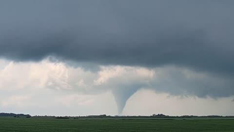 Stovepipe Tornado With No Rotating Wall Near a Town