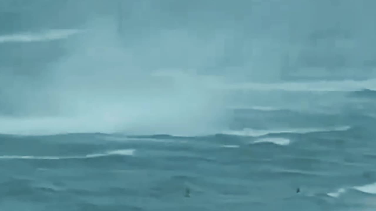 Footage Capture WaterSpout Ripping through crowded Beach