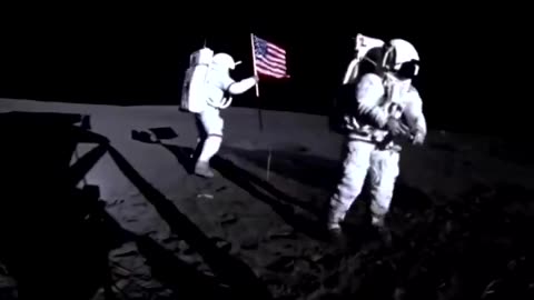Apollo14 astronauts Alan Shepard and Edgar Mitchell plant an American flag on The Moon, 1971