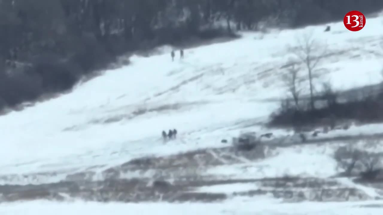 Russian soldiers carrying the wounded in snowy area were hit by mortar fire - two strikes in a row