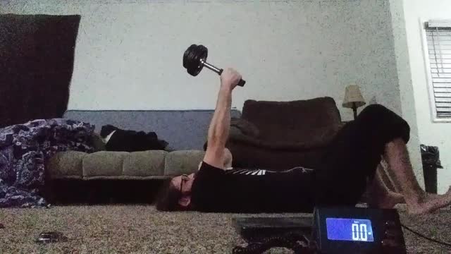 Laying sledgebell arm extended wrist deviation