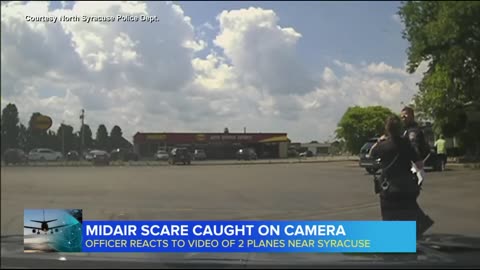 Dashcam video captures moment two planes appear to be on a collision course.