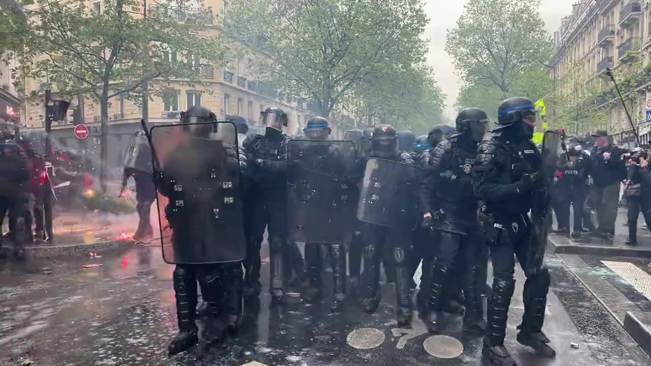 Police rushed in to disperse rioters at the May Day riot in Paris.