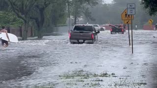 Surfing in the Street After Hurricane Ian