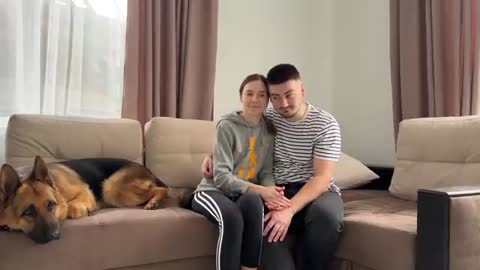 What does a German Shepherd do when i hug my wife