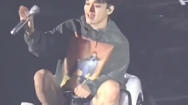 Just chen driving the toy car in a concert.