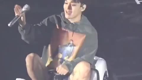 Just chen driving the toy car in a concert.