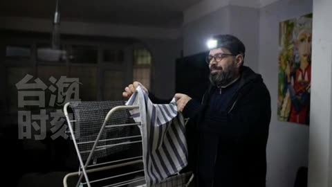 A British family wears headlamps to save money on electricity