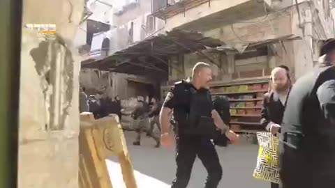 ISRAELI police on Wednesday raided the anti-Zionist Jewish neighborhood in occupied Jerusalem