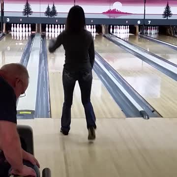 Girl is Throwing a Bowling Ball or Maybe She Is Not