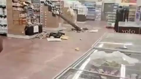 A large fragment of an intercepted rocket reportedly landed in a supermarket in