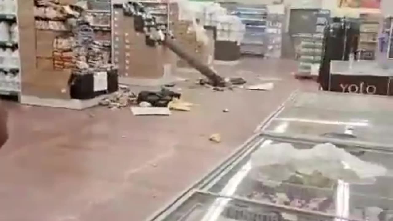 A large fragment of an intercepted rocket reportedly landed in a supermarket in