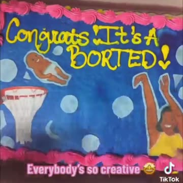 Black woman celebrates killing black baby with a cake