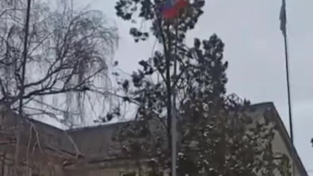 Ukrainians lower the Russian flag