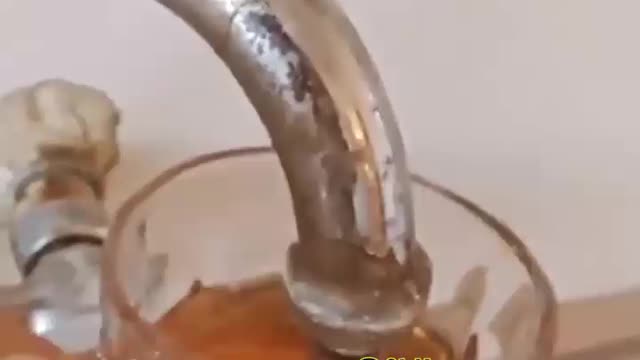 Swallowing tea by faucet