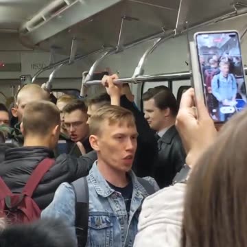 St.Petersburg metro yesterday. Singing a war song "The Sacred War"