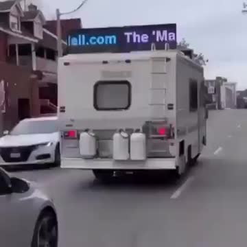 Look at the electronic billboard