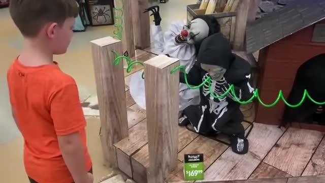 Kid Jump Scared by Lil Skelly Bones @ Spirit Halloween - got him good!!