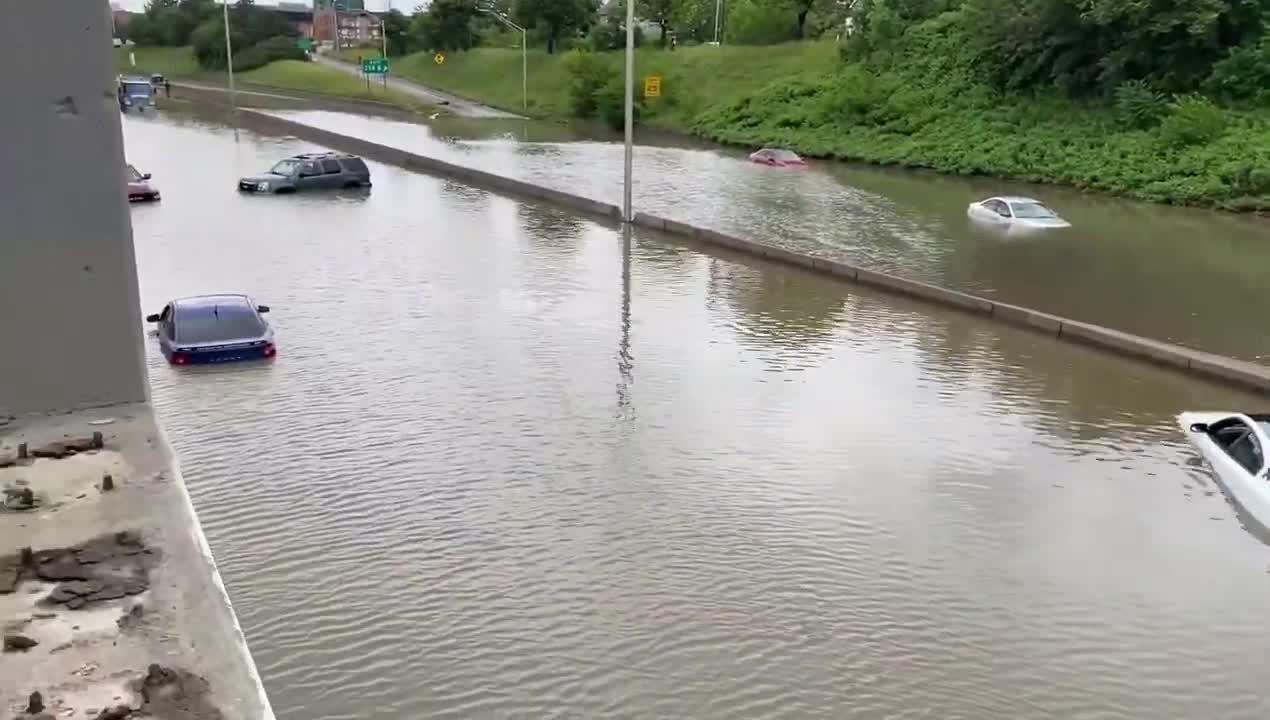 Overnight Flooding Due to Excessive Rain Traps Submerged Cars on Freeway