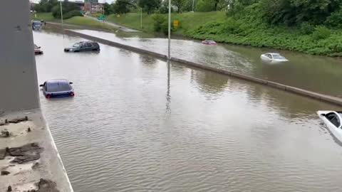 Overnight Flooding Due to Excessive Rain Traps Submerged Cars on Freeway