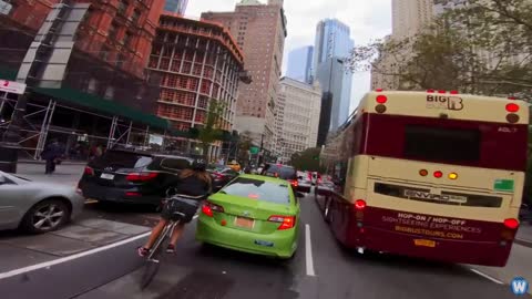 Bike Messenger Riding Fast and Fluid Through NYC Traffic