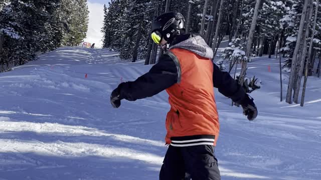 Snowboarder Trying to 50/50 Taco's Around Rail